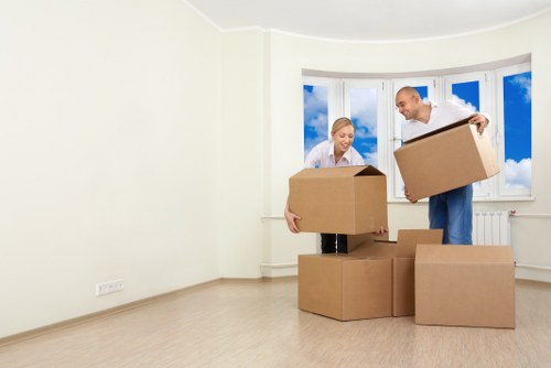 Local furniture pick-up team handling sofas and chairs in Harringay