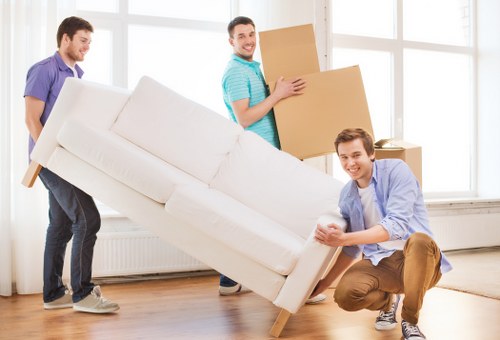 House removal team preparing furniture for a move in Harringay